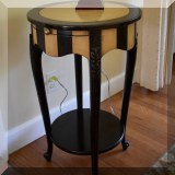 F05. Round painted side table 27”h x 17” 